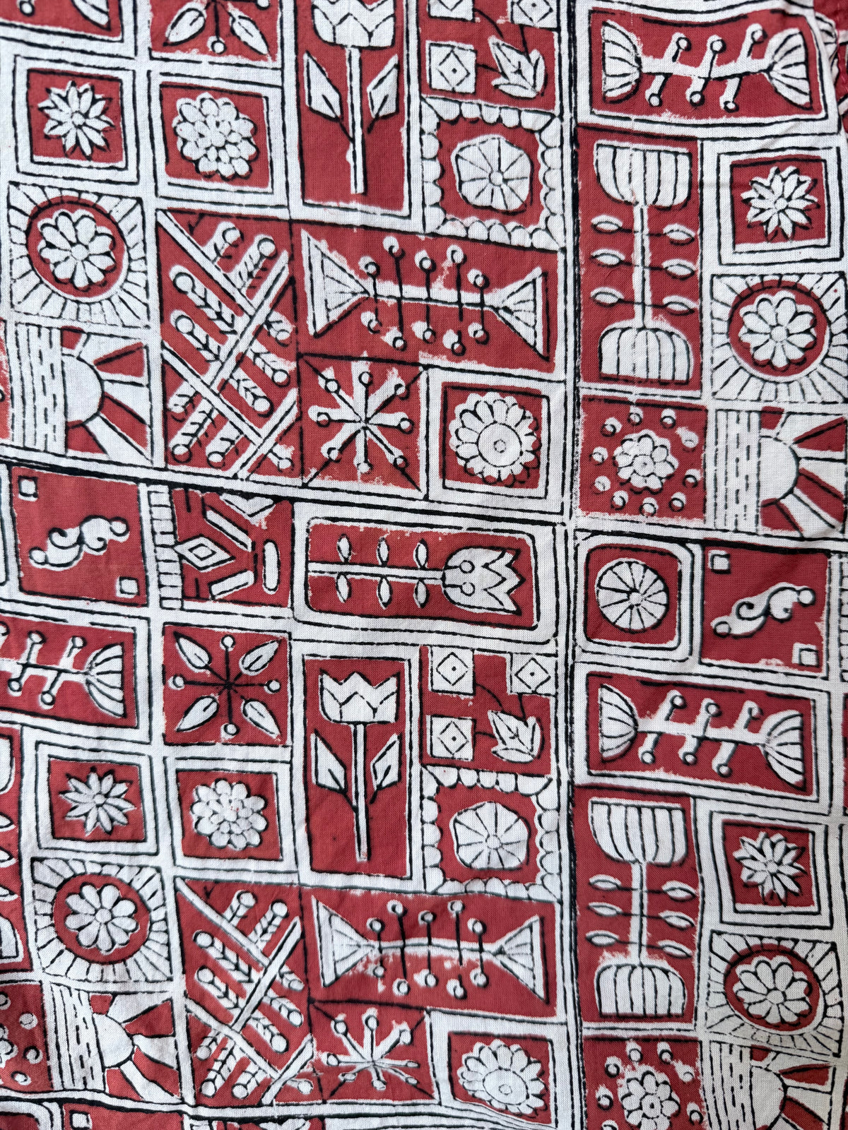 The Relaxed Overall, Cream Whimsy on Red, fabric closeup