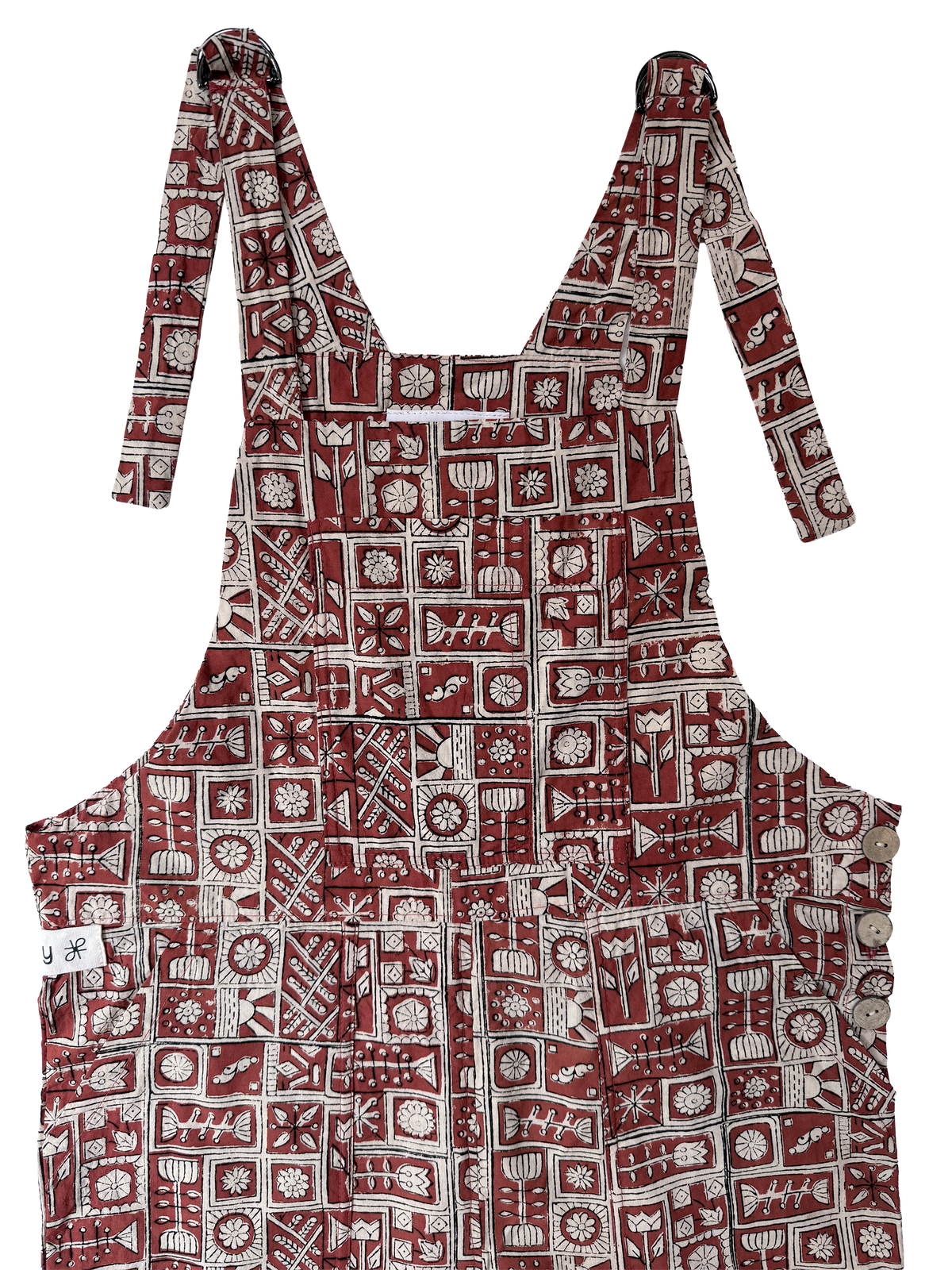 The Relaxed Overall, Cream Whimsy on Red, front view closeup