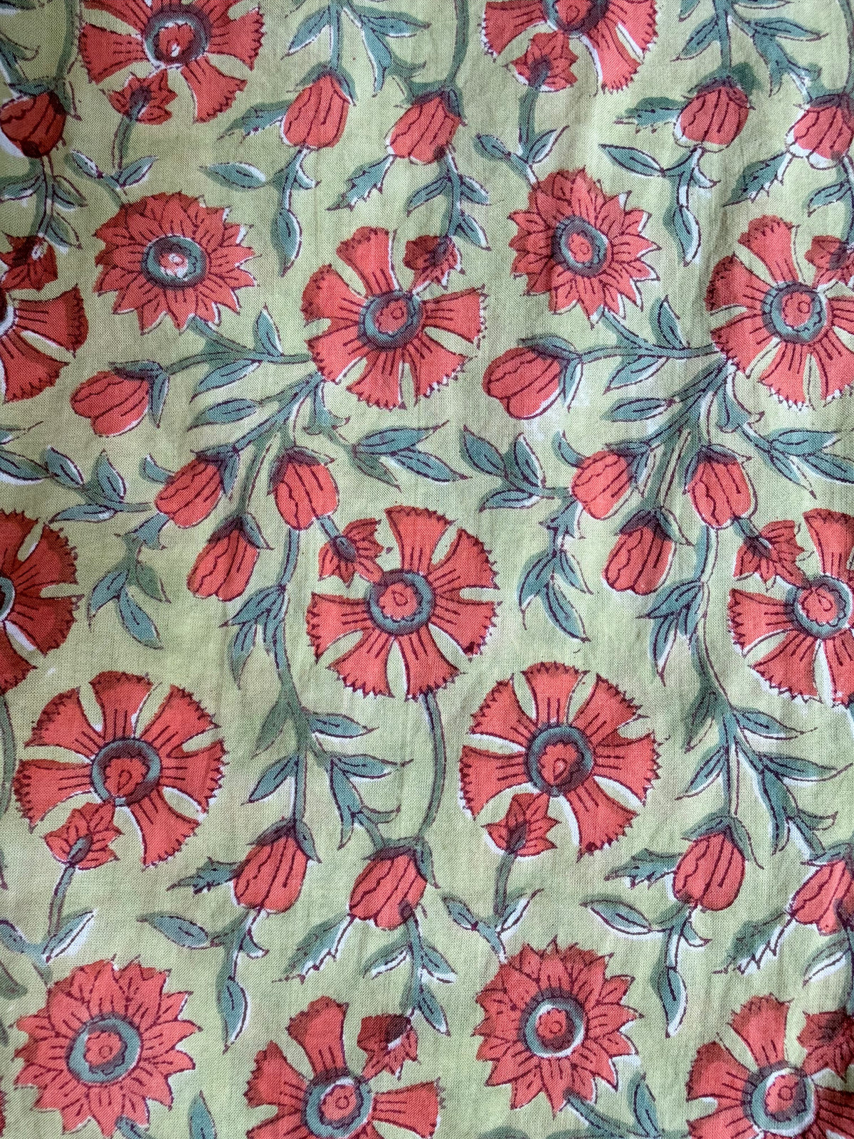 Orange Gola Flower cotton overalls fabric closeup